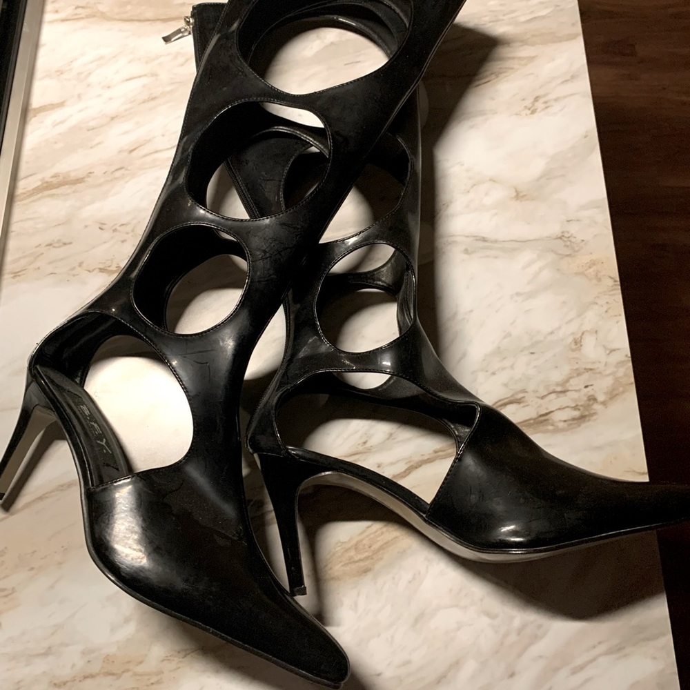 Never worn size 10 patent leather boots
